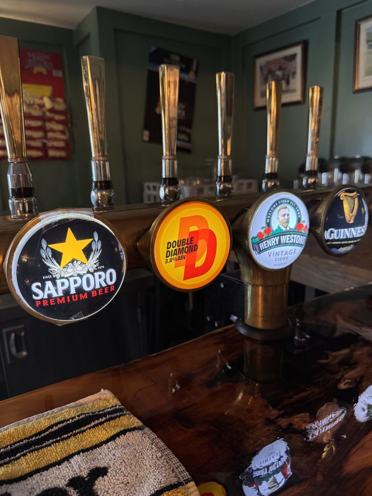 Beer taps at the bar of the Duke of Cumberland's Head, including the relaunched Double Diamond